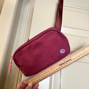Lululemon Everywhere Belt Bag Mini Ripstop in the color pink
